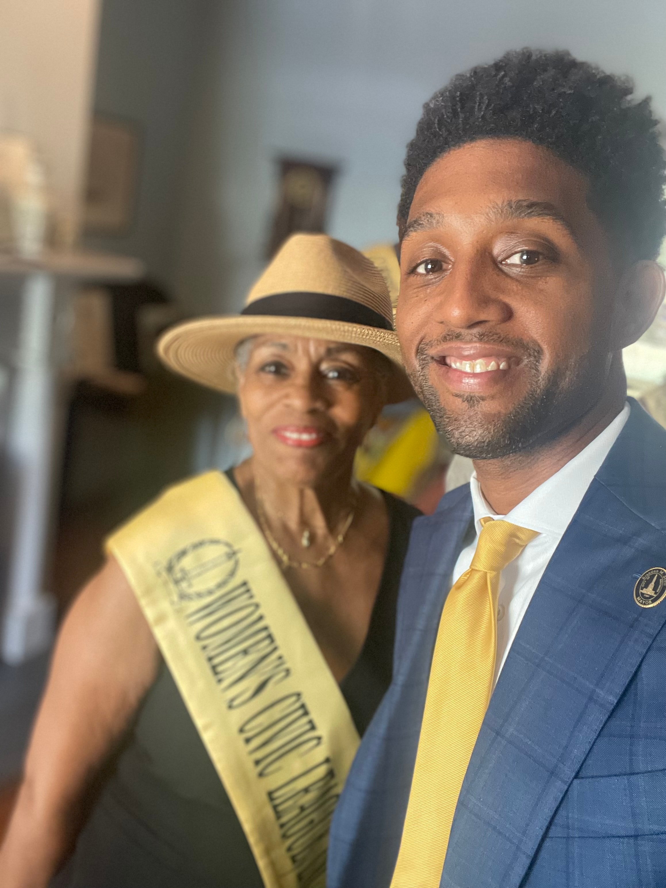WCL member with Baltimore's Mayor — civic engagement in action